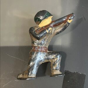 Dynamic Soldier Sculpture in Black and Brown